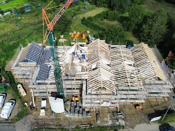 Gundlach baut Kita in Stadthagen Bau einer Kita in Stadthagen. Im Bild ist der Rohbau zu sehen. Unser Bauunternehmen für Hochbau errichtet die Kita in Holzhybridbauweise