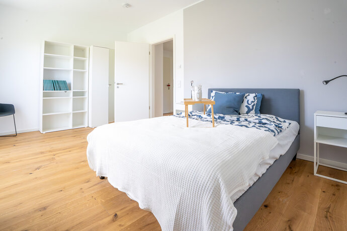 Schlafzimmer_Wohnung kaufen_Außenansicht_Anlageimmobilie Herzkamp Eigentumswohnung kaufen_Gundlach Bauträger aus Hannover